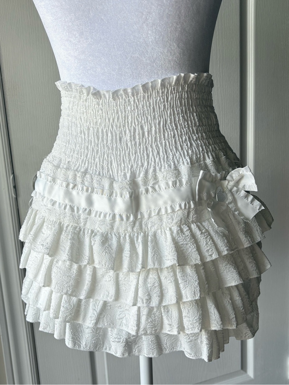 White Ruffled Mini Skirt with Bow detail